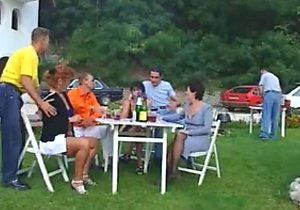 Lingerie-wearing beauty sucks cock outdoors