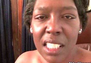 Black-skinned beauty enjoys strange torture