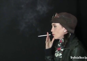 Stunning brunette babe is sucking a long wiener with pleasure